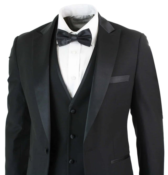 Join the ranks of the well dressed with a little help from Paul Andrew's Regent Suit. A stunning black Tuxedo. while full lining ensures an easy glide over shirts or knitwear.Offset the suit with a crisp white shirt and complete the look with one of Paul Andrew's Black Bow Ties.