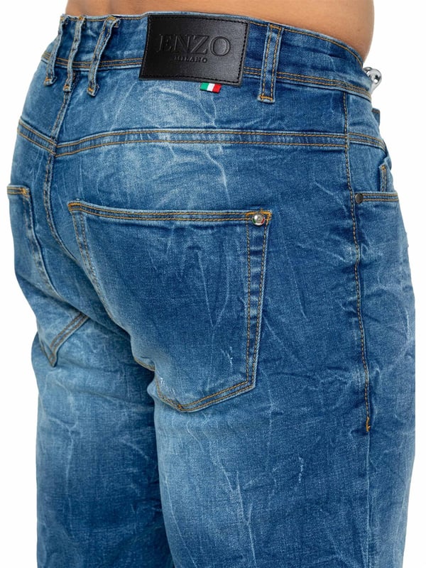 Mejora tu colección de denim con los Enzo Men's Distressed Ripped Jeans. Diseñados para el hombre moderno, estos jeans combinan estilo y comodidad con un corte clásico de pierna recta y un diseño versátil de 5 bolsillos. La tela elástica asegura un ajuste perfecto y máxima comodidad, permitiéndote moverte con facilidad durante todo el día. Con cierre de cremallera, detalles desgastados y un parche trasero de la marca, estos jeans añaden un toque rudo y elegante a tu atuendo. Perfectos para salidas casuales o una noche fuera, los Enzo Men's Distressed Ripped Jeans combinan estilo y funcionalidad sin esfuerzo.