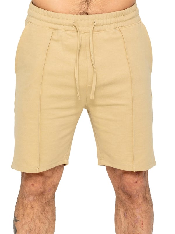 Enzo Mens Casual Stretch Shorts offer comfort and convenience with 2 side & 2 back pockets, elastic waistband & adjustable drawstring, and front pin tuck seam detail for added style and functionality. Perfect for errands or lounging with a practical and stylish design.