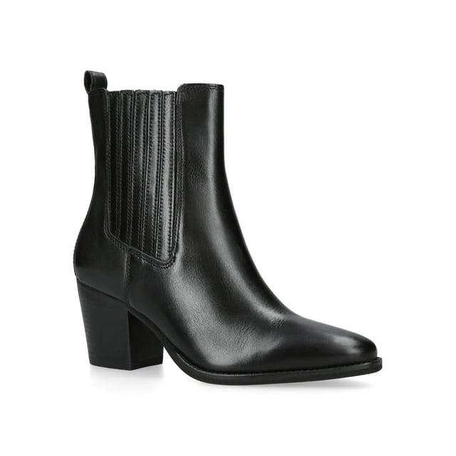 The Carvela Rodeo is a cowboy style boot featuring a black leather upper with elasticated ankle for comfort when slipping on. The nail of the ankle features a small pull tab and Icon C stud. Heel height: 70mm