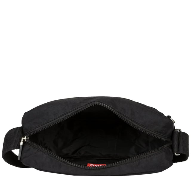 This practical everyday bag is heavy on features and light in weight, with two main zip compartments and a hidden zip on the front flap as well as your main zipped compartment it is more than ideal for organising your valuables. This casual, compact design also features an adjustable cotton strap for all your comfort needs. This functional fun design is stylish and spacious for all your travelling needs, from the supermarket to a Saturday hike. Features: , Artsac rubberised patch logo, Two main zip compartments, Adjustable strap, Concealed front zip section, Front flap-over with 2 zip pockets, Internal zip and slip pocket, External zip pocket on the back Style Ref: 50460 BLACK