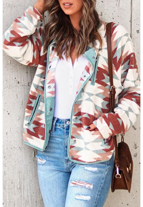 Stylish and trendy Red Western Aztec Buttoned Zipper Pockets Fleece Jacket
  Vibrant red color adds a pop of color to any outfit
  Western-inspired design with Aztec details
  Buttoned closures and zipper pockets for added functionality
  Made from soft and cozy fleece material
  Perfect for cooler weather
  Versatile addition to your wardrobe