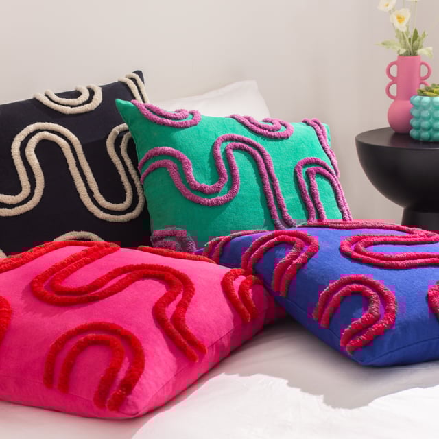 If you like something a bit more abstract, then this feel-good cushion is for you! Featuring soft and fluffy tufts of cotton that wind their way across the face of the cushion, set against a contrasting cotton background, this statement piece adds spades of vibrant colour to your living space. Be loud and proud with the Archie Cushion!