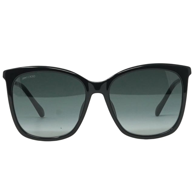 Jimmy Choo Nerea/G/S 807 Black Sunglasses. Experience luxury and sophistication with the Jimmy Choo Nerea/G/S 807 Sunglass. Crafted from the finest materials, these sleek sunglasses feature 100% UVA/UVB protection and refined metallic accents. Admire the sophisticated Jimmy Choo style with these timeless sunglasses.. Black Sunglass, Nose Bridge Width = 17mm, Lens Width = 57mm, Arm Length = 145mm. Branded Sunglasses Case and Cleaning Cloth Included. 100% Protection Against UVA &amp; UVB Sunlight and Conform to British Standard EN 1836:2005, Sunglasses, Sunglasses Case, Cleaning Cloth and Care Instructions all Included. Jimmy Choo Nerea/G/S 807 Sunglass