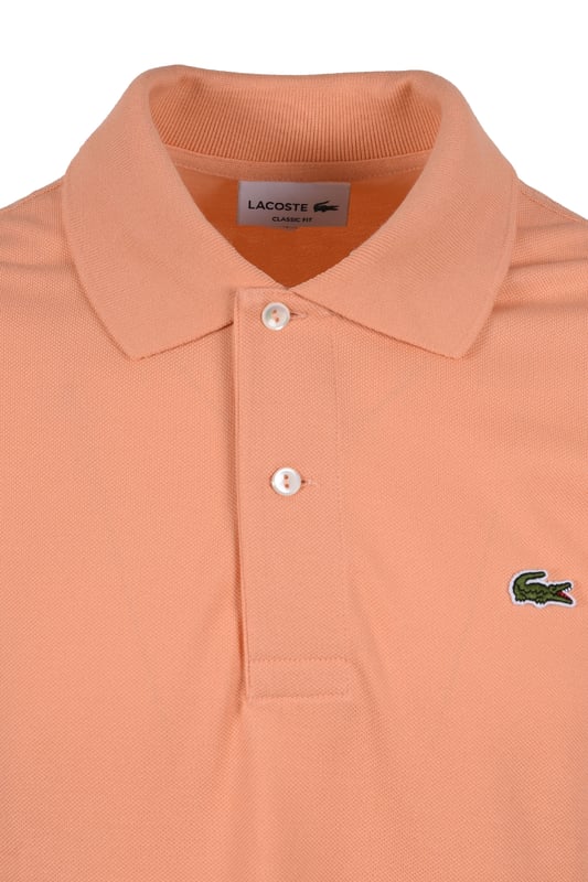 Lacoste L.12.12 Piqué Cotton Polo Peach
In 1933, Lacoste revolutionised sportswear. With a single collar, a button placket and a Pique knit, the Original L.12.12 polo was born. First ever polo shirt, the Original L.12.12 slim fit offers a Classic Lacoste Fit.

Petit Piqué, the Lacoste signature knit
Ribbed collar and sleeves
Slim fit, fitted cut
Genuine mother of pearl buttons
Embroidered crocodile sewn on the chest
Cotton (100%)
Style - L.12.12