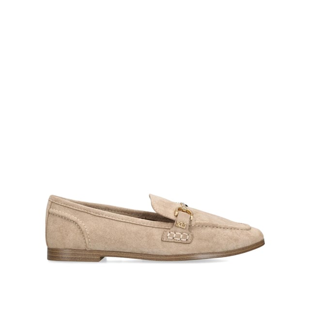 The KG Kurt Geiger Madeline is a taupe microsuede slip on loafer. There is an antiqued brass horse bit chain across the toe and small KG Kurt Geiger stud.