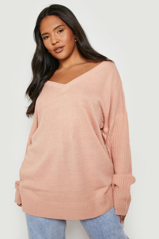 Upgrading your winter look is easy with this plus size jumper from our latest knitwear drop. Keeping you cosy with its soft fabric and knitted texture, it's perfect for layering over all your outfits, whether that's your go-to jeans or a long sleeve smock dress. Featuring long sleeves perfect for cold weather styling, this style is giving us all the cosy vibes. This season it's all about going big, so grab an  oversized plus size jumper to take your winter streetwear to new heights - just team with chunky boots and a dreamy coat.Style: JumperFabric: KnittedNeckline: V NeckSleeve Length: Long Sleeve