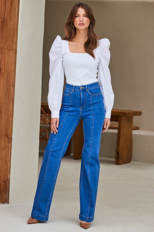Add them to your denim line-upCrafted from our signature soft stretch denimFresh bright blue washPintuck seam creates the illusion of endless legsTrending wide-leg cut: flattering and comfyDay or night, dressed up or downInside leg to fit: 27"
