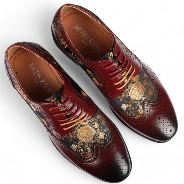 Add a unique touch to your formal wardrobe with the Ross Men's Floral Print Leather Brogue Shoes. Crafted from 100% premium leather, these brogues combine style, durability, and comfort. Featuring classic brogue detailing with decorative patterns, they bring elegance and sophistication to any look.

Unique Floral Print for a bold, stylish statement
Premium Leather for durability and luxury
Classic Brogue Detailing for timeless appeal
Lace-Up Design for an adjustable fit