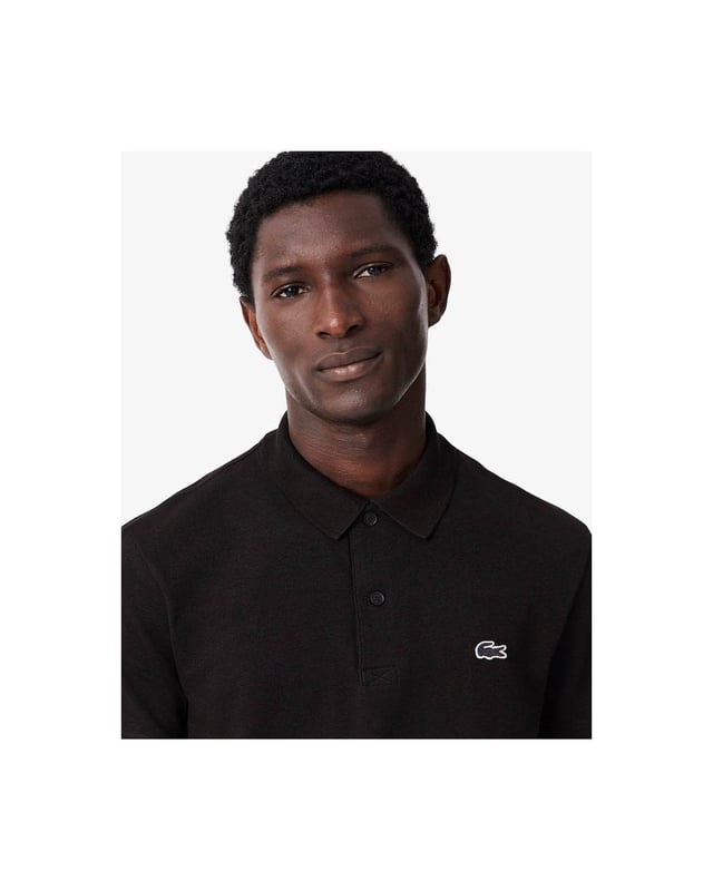 A new take on elegant sportswear with full freedom of movement from Lacoste, inventors of the polo shirt in 1933. This cotton blend knit piece features a fine rib that's particularly pleasant to wear. Featuring iconic styling and sophisticated finish details: the stuff of legends.

Organic cotton blend ottoman fabric
Regular, straight cut
Polo collar, inspired by the Original L.12.12
Pad printed detail at neck
Embroidered crocodile on chest
Main fabric: Cotton (57%), Polyester (32%), Elastane (11%) / Collar: Cotton (53%), Polyester (47%)