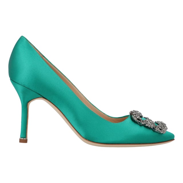 Satin almond toe pumps featuring a square crystal buckle encased in a gunmetal frame. Finished with a stiletto mid heel.

Upper: 68% viscose, 32% silk.
Sole: 100% cow leather.
Lining: 100% kid leather.
Heel measures 90 mm.
Made in Italy.