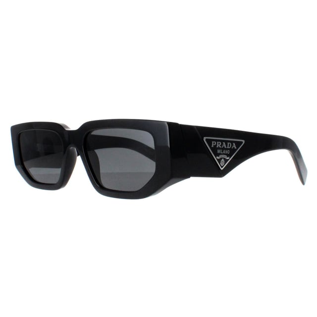 Prada Rectangle Unisex Black Dark Grey PR09ZS  Sunglasses are a sleek rectangle frame meticulously crafted from premium acetate, ensuring durability and comfort. The iconic Prada logo graces the temples, a mark of refined luxury. Offering both style and practicality, the lenses provide superb UV protection alongside exceptional clarity, making them the perfect companion for sunny escapades or everyday wear.