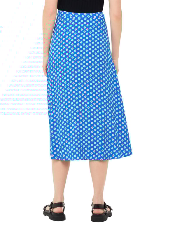 Step out in playful style with this charming blue midi skirt adorned with a delightful polka dot floral pattern. Crafted from eco-friendly viscose, this piece is perfect for everyday elegance.