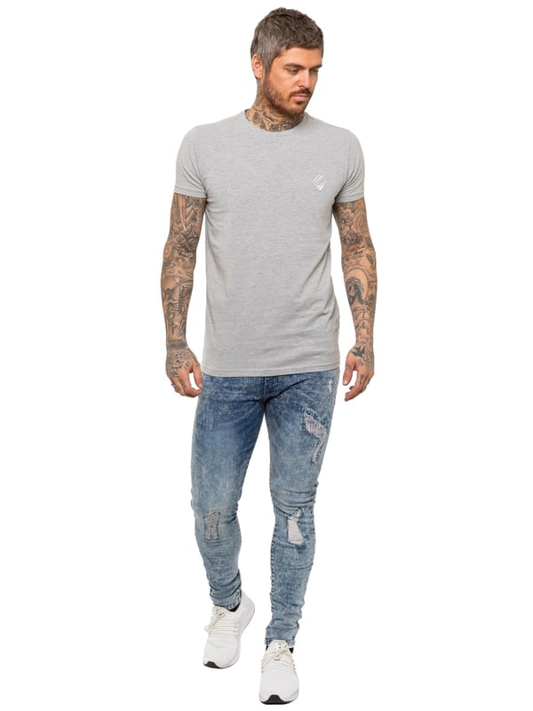 Enzo Mens Skinny Stretch rasgó los jeans angustiados. Efecto de rasgadura y reparación, cierre de mosca Zip. Dos bolsillos delanteros, dos bolsillos traseros, bolsillo de una sola moneda. Remaches y botones de marca.