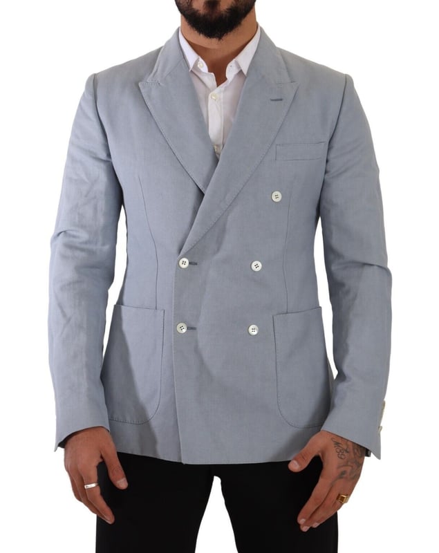 Brand: Dolce & Gabbana
  Style: Double breasted
  Fitting: Slim fit
  Colour: Light Blue
  Made in Italy
  Material: 60% Cotton 40% Flax
  Lining: 100% Viscose
  Logo details
  Very exclusive and high craftsmanship
Material: 60% Cotton 40% Flax