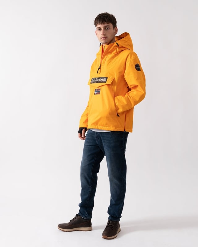 The embodiment of Napapijri's heritage, the Rainforest has been keeping people warm and sleek since 1995. The beloved anorak returns with new rubber branding, a double-zip fastening, ventilation eyelets and an adjustable hem and hood. It's built for the outdoors with breathable, water-resistant fabric and down-free, recycled padding insulation that provides lightweight warmth in cold weather.

Anorak
Waterproof fabric: 3000Mmh20 (suitable for light rain and snow)
Breathable fabric: MVP 3000G/m2-24 hour
Critically taped seams
Side zip fastening
Advanced hood regulation
Ventilation eyelets
Inner cuffs
Adjustable hem
Additional inner collar opening
Patches
Printed details

Main fabric: 100% Recycled PolyesterLining: 100% Recycled PolyesterPadding: Comfortemp® Padding 100% Recycled Polyester
NA4IB9
 