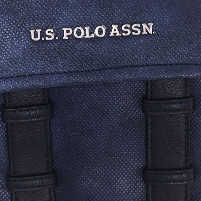 Men's shoulder bag from the U.S. POLO ASSN brand.
 Synthetic material exterior.
 Top zipper closure.
 Front exterior: One pocket with magnet closure.
 Rear exterior: One zipper pocket.
 Front interior: One open pocket.
 Back interior: One zipper pocket.
 Adjustable strap.
 Interior lining with brand print.
 Brand logo on the front.
 Measures: 18x23x6cm
 Composition: 100% Polyurethane
 Care:
Clean with a wet cloth.