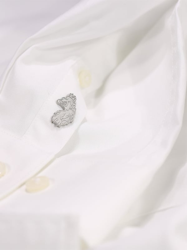 A clean cut essential that's built to last. This time-less shirt from LUKE is a wardrobe staple, cut from a soft cotton blend and secured with imitation river shell plastic buttons. It is then complete with the brand's iconic metal lion head rivet on the left cuff.