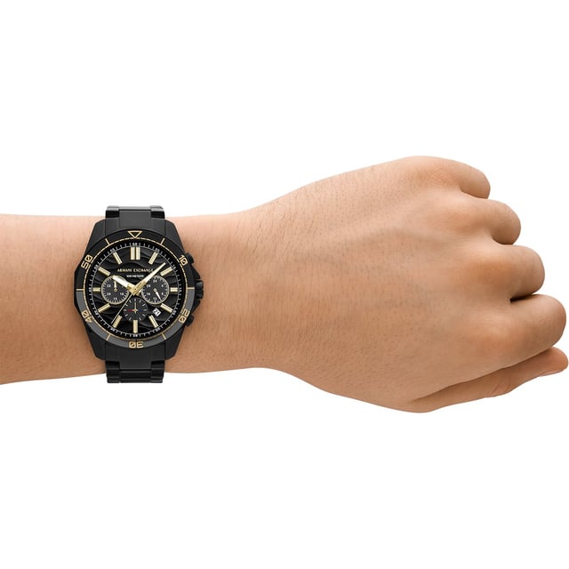This Armani Exchange Spencer Chronograph Watch for Men is the perfect timepiece to wear or to gift. It's Black 44 mm Round case combined with the comfortable Black Stainless steel watch band will ensure you enjoy this stunning timepiece without any compromise. Operated by a high quality Quartz movement and water resistant to 5 bars, your watch will keep ticking. This sporty and fashionable watch gives you a unique feeling in every outfit! This Chronograph watch has a calendar function: Date , Stop Watch , 24-hour Display , Luminous Hands and Luminous Numbers High quality 21 cm length and 21 mm width Black Stainless steell strap with a Fold over with push button clasp Case diameter: 44 mm,case thickness: 13 mm, case colour: Black and dial colour: Black