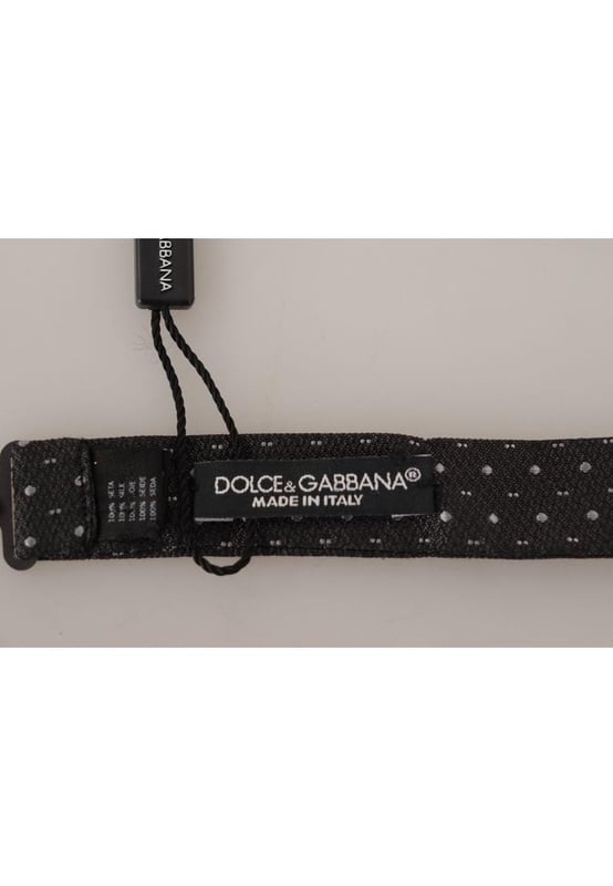 100% Authentic Dolce & Gabbana Silk Bow Tie
  Color: Black and Gray Polka Dot
  Model: Tied
  Material: 100% Silk
  Adjustable length neck strap one size
  Made In Italy
  Width: 6cm
Material: 100% Silk