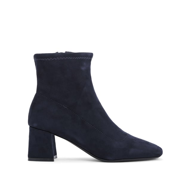 The Quant Ankle Boot is crafted from a navy microsuede. This boot has a higher ankle and block style heel.