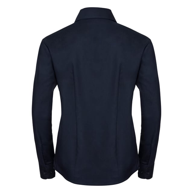 Tried and tested workplace staple that combines exceptional durability with great attention to detail. Elegant ladies shirt cut, high quality Oxford fabric with excellent finish. 2 button collar stand with classic shaped collar. Darts at bustline and back for tailored fit. Rounded 2 button adjustable cuffs. Rounded hem. The darts on the back panel are positioned in the lower part, to allow for unrestricted decoration possibilities on the upper part. Also available in mens sizes, code 932M. Weight: 130-135g/m². Fabric: 70% Cotton 30% Polyester Oxford. XS (30-32: To Fit (ins), 8: Dress Size). S (32-34: To Fit (ins), 10: Dress Size). M (34-36: To Fit (ins), 12: Dress Size). L (36-38: To Fit (ins), 14: Dress Size). XL (38-41: To Fit (ins), 16: Dress Size). 2XL (41-44: To Fit (ins), 18: Dress Size). 3XL (44-47: To Fit (ins), 20: Dress Size). 4XL (47-51: To Fit (ins), 22: Dress Size). 5XL (51-54: To Fit (ins), 24: Dress Size). 6XL (54-57: To Fit (ins), 26: Dress Size). RUSSELL COLLECTION - a variety of Mens and Womens corporatewear in a wide range of styles, colours and sizes.