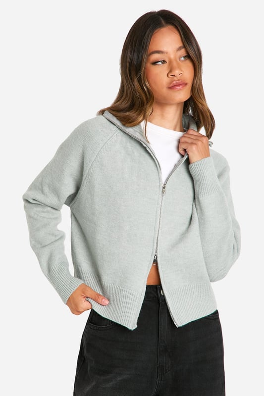 Tall-fit cardigan for extended length and coverage
        Funnel collar design for added warmth and style
        Full-length zip closure for versatile wear
        Ribbed cuffs and hem for a snug fit
        Relaxed silhouette perfect for layering
    
    This tall cardigan with funnel collar and zip is a must-have addition to your casual wardrobe. Its versatile design allows for effortless styling, whether you're heading to a family gathering or a laid-back outing with friends. Layer it over a simple white tee and pair with wide-leg trousers for a chic, comfortable look. The full-length zip offers flexibility, allowing you to adjust your level of warmth throughout the day. For a cosy night in, team it with your favourite leggings and slip-on trainers. The funnel collar adds a touch of sophistication, making it suitable for slightly dressier casual occasions. This cardigan is perfect for those in-between seasons when you need an extra layer without the bulk of a heavy coat. Its relaxed fit ensures comfort without compromising on style, making it a versatile piece you'll reach for time and time again.