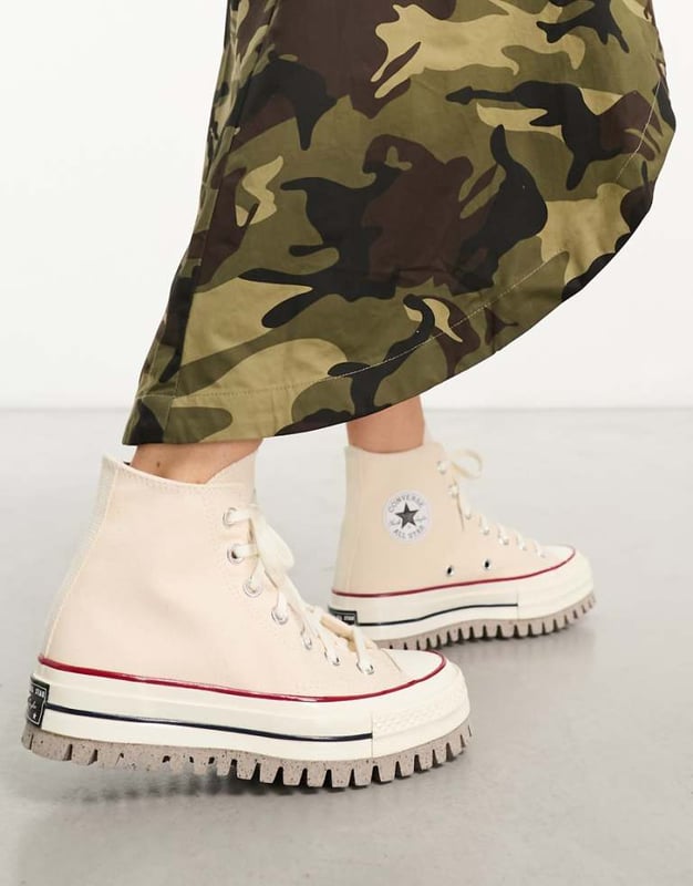 Shoes by Converse New kicks for your 'fit High-top design Lace-up fastening Signature Converse branding CX foam insole and midsole absorb impact and provide lightweight cushioning Chunky sole Lugged treadSold By: Asos