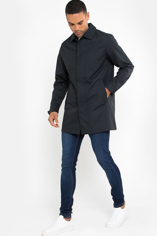 Upgrade your style with this Threadbare showerproof tailored coat, a classic longline style to bring class and sophistication to your look without the effort. This stylish showerproof mac has two side entry front pockets and button down fastening. The collar adds to the smart, tailored feel. Cut in a regular length, it is finished with a printed lining and adjustable button cuffs. Perfect if you want to bring a touch of finesse without making too bold a statement.