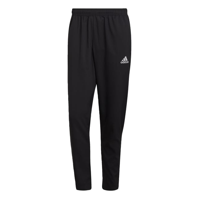 Part of the grassroots, football-focused Entrada 22 collection, these adidas pants were made to be seen. Clean and classic, they'll give your team a unified look on and off the pitch. Moisture-wicking AEROREADY keeps you comfortable. Ankle zips help you get them off quickly when it's time to do your thing.Made with 100% recycled materials, this product represents just one of adidas' solutions to help end plastic waste.  - This model is 186 cm and wears a size M. Their chest measures 99 cm and the waist 80 cm. - Regular fit with mid rise - Elastic waist with drawcord - 100% recycled polyester plain weave - Moisture-absorbing AEROREADY - Front zip pockets - Ankle zips  Shipped by adidas