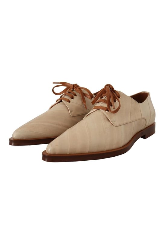Marca: Dolce & Gabbana.
  Modelo: Pisos formales.
  Color: Beige.
  Material: 100% cuero de anguila.
  Suela: Cuero.
  Cierre: Con cordones.
  Detalles del logotipo.
  Alta calidad y comodidad.
  Fabricado en Italia.
