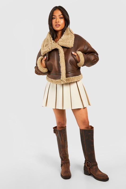 Keep toasty this season with our collection of petite coats and jackets. From petite trench coats to petite teddy coats, our coats for petite women are specifically designed to fit all you girls sitting pretty at 5'3'' and under. Step out in a petite blazer or pass the vibe check in a petite puffer jacket. Whatever your style, we've got you, girl. This one would look dreamy with a pair of straight leg jeans, an oversized hoodie and chunky trainers.Style: Aviator JacketFabric: PULength: RegularSleeve Length: Long Sleeve