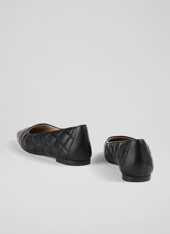 LK Bennett Carolina Flats, Black Every wardrobe needs a chic pair of flats, and our Carolina ballerinas have an elegant feel thanks to their classic quilting. Crafted in Spain from black quilted nappa leather, they have a square toe, a sleek silhouette and a slight heel. Wearable and with minimalist appeal, pair them with tailored trousers or jeans for an understated everyday look.