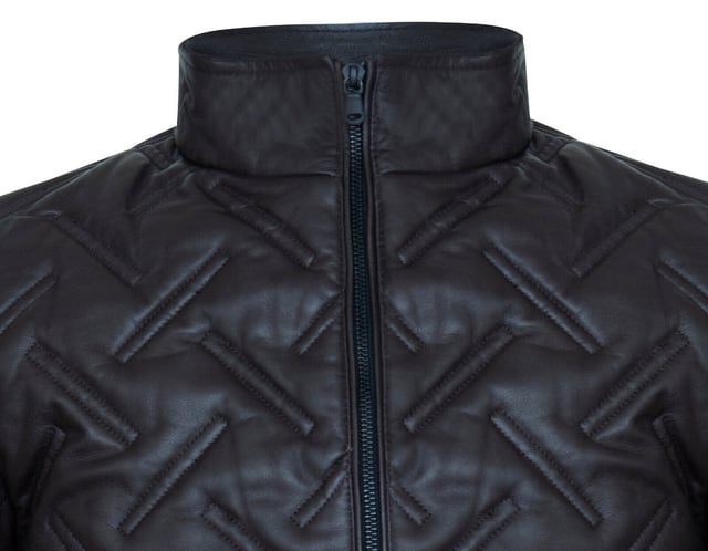 Introducing our highly anticipated Infinity Signature Range, representing two years of dedicated craftsmanship and innovation. Our latest offering, the leather bomber jacket, embodies luxury and functionality. Crafted from premium sheep nappa leather, its unique alternating diagonal quilt stitching ensures both style and warmth. The sleek UMZ zip extending to a stand collar adds a modern touch, while rib knit trimming on the hem and cuffs seals in warmth. With two zipped handwarmer pockets at the waist and three internal pockets in the satin-lined interior, including two zipped for security and one with a velcro tab for your mobile phone, convenience meets sophistication. Prepare to elevate your wardrobe with the epitome of elegance and quality. Key Design Features: Meticulous Craftsmanship and Innovation: Two years of dedicated craftsmanship and innovation have gone into creating this remarkable jacket.Premium Sheep Nappa Leather: Crafted from the finest sheep nappa leather for quality and durability.Sleek UMZ Zip and Rib Knit Trimming: The UMZ zip and rib knit trimming add style and ensure warmth.Multiple Pockets: Featuring multiple external and internal pockets for convenience and security.Luxurious Satin-Lined Interior: The satin-lined interior adds a touch of luxury, with thoughtful design elements for added functionality