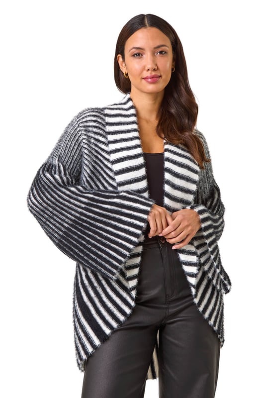 Shawl Fluffy Striped Knit Cardigan from Roman. Wrap up in style this Autumn/Winter with this shawl fluffy striped cardigan. The perfect layering piece, this cosy cardigan features stylish stripes and long sleeves, ideal for keeping you warm during the colder months. Whether you're running errands or meeting friends for coffee, pair it with a simple t-shirt and jeans for a laid back yet chic look.