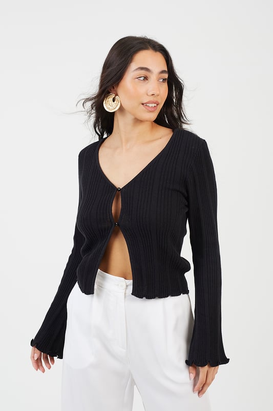 Enhance your style with this open-front ribbed cardigan from Brave Soul. Crafted from 100% cotton and features an open front with two button fastening, wide sleeves, and lettuce cuffs. Team with a pair of wide-leg trousers for an elevated stylish look. Model wears UK size S.