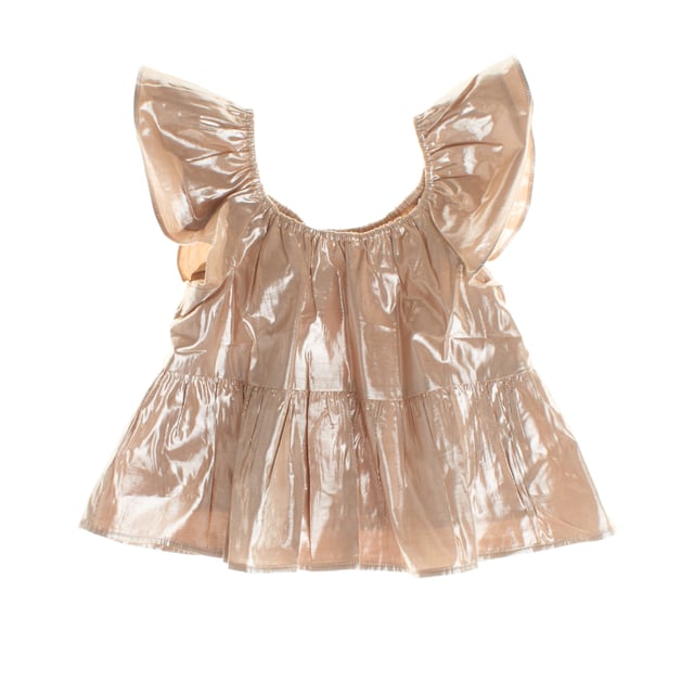This girls' blouse stands out for its shiny, flowing fabric, which gives it an elegant and festive touch. It features a wide, flared sleeve design, which adds volume and a sophisticated look.

 The neckline has a gathered detail with elastic, ensuring a comfortable and flexible fit.

 The bottom of the blouse falls in light layers, providing a fluid, loose silhouette.

 It is an ideal garment for special occasions, perfect to complement a distinguished and fashionable look.
 Composition: Exterior: 74% Viscose, 26% Metallic; Interior: 100% Cotton
 Care:
- Machine wash cold on delicate cycle.
 - Use mild detergents.
 - Use dryer at low temperature.
 - Iron at low temperatures.
 - Do not dry clean.