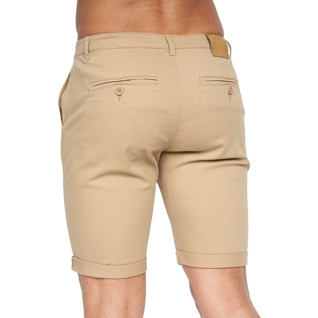 98% Polyester, 2% Elastane. Fabric: Canvas, Stretch. Design: Logo. Pockets: 2 Side Pockets, 2 Back Pockets, Jet Pocket, Buttoned. Fastening: Button, Zip Fly. Style: Chinos. Back Yoke, Belt Loops, Darted, Gripping Inner Waistband, Mock Horn Buttons, Self Fabric, Twin Needle Stitch.