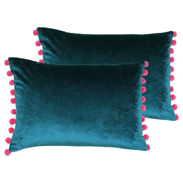 The name gives away this cushion’s greatest asset. The Fiesta cushion, aptly named after the Spanish word for festival, is a plethora of bright colours and mixed tones. The velvet body of the cushion is an absolute delight to touch thanks to its sublimely soft texture and catches the light from every angle. Contrasting coloured pompoms feature along the edges to further enhance the fun and tactile nature of this cushion. With a hidden zip closure nothing takes away from this cushions unique design. While this cushion cover is not machine washable due to its gorgeous pompoms it is iron appropriate.