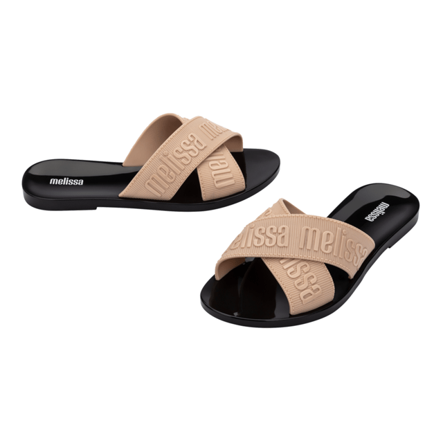 Join the multistrap trend with the Melissa M Lover Slide, the ticket to becoming a footwear icon! Lightweight and available in a variety of delightful colors, the sandal is inspired by the current fashion scene and features the unmistakable Melissa charm. Grab the perfect pair, pronto!