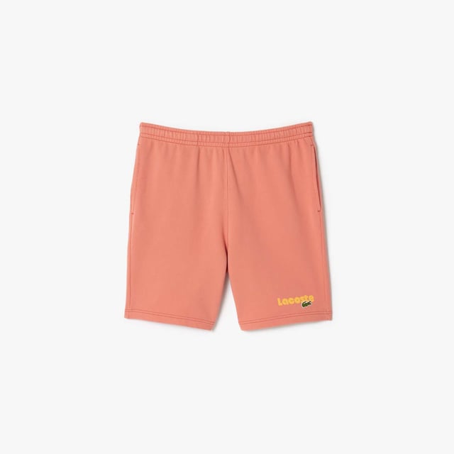 Washed Effect Lacoste Print Jogger Shorts Organic cotton fleece Regular fit  straight cut  Drawstring waist Contrast Lacoste print Embroidered crocodile on front Washed Effect Lacoste Print Jogger Shorts Organic cotton fleece Regular fit  straight cut  Drawstring waist Contrast Lacoste print Embroidered crocodile on front