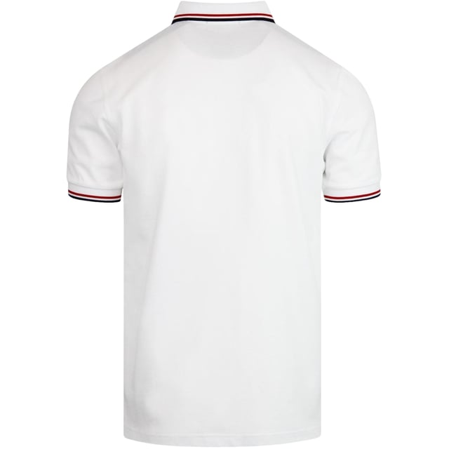 The Twin Tipped Fred Perry Polo Shirt by Fred Perry is a short sleeved polo shirt that has been made from Fred Perry's classic cotton piqué, in a contemporary adaptation of Fred's famous streamlined fit. Available in a diverse range of colourways - each with their own unique story. Featuring the signature Fred Perry wreath logo to the chest and twin tipping to the collar and cuffs.