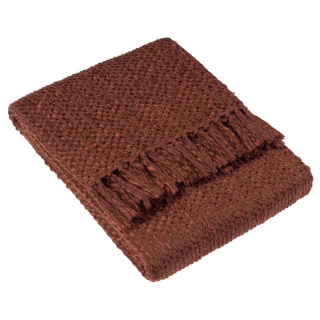 In muted earthy tones and solidly crafted from super soft, woven blends of yarn, the Morni throw instantly creates a warm, understated style for your soft furnishings. The design is complimented by tassel fringing on two sides and is ideal if you love to build up textures within a modern, neutral interior.