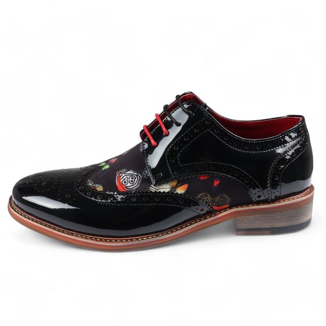Step up your formal style with the Justin Reess Julius Men's Butterfly Print Patent Leather Brogue Shoes. These shoes feature a striking butterfly print on premium patent leather, adding unique flair to any formal outfit. With classic brogue detailing along the toe cap and edges, combined with a polished lace-up design, these shoes offer a sophisticated and timeless look. Ideal for weddings, business meetings, and special occasions, they bring elegance and personality to your wardrobe.

Unique Butterfly Print for standout style
High-Quality Patent Leather for a sleek, polished look
Classic Brogue Detailing for added sophistication
Versatile Formal Wear perfect for any formal event