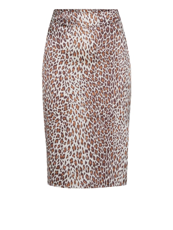 100% poliéster; Falda Guess Falda Joscelin;  Modelo: Q3GD51WF310 P1AR;  Mano de obra de alta calidad;  cintura alta;  longitud de la rodilla;  cremallera trasera;  hendidura trasera;  Detalles del logotipo de Guess.
