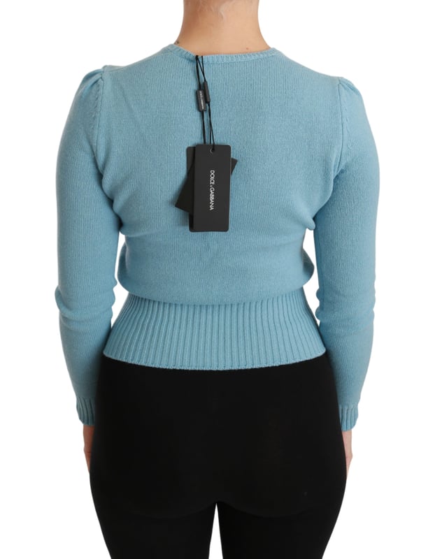 Varumärke: DOLCE \u0026 GABBANA\n  Modell: Crew Neck Pullover Topp tröja\n  Material: 100% Ull\n  Färg: Blå\n  Motiv: Drottninghjärta\n  Broderad krona med pärlor\n  Logotypdetaljer\n  Tillverkad i Italien\n  Exklusivt och högklassigt hantverk\nMaterial: 100% ull