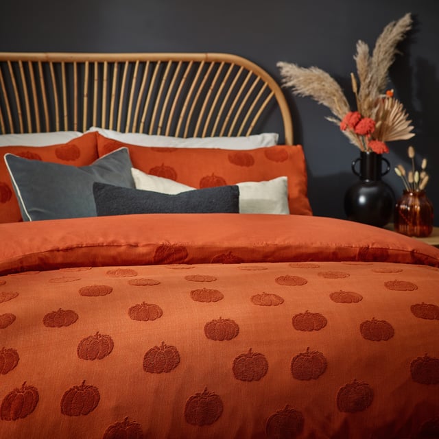 When the nights are drawing in and the weather is turning, why not add this warming duvet cover set, which is a pared back autumnal take on Halloween. Adorned with soft tufts of cotton in the shape of pumpkins and surrounded by a spiced orange 100% cotton fabric. This design adds a pop of colour to your bedroom, providing an elegant alternative to traditional Halloween décor.