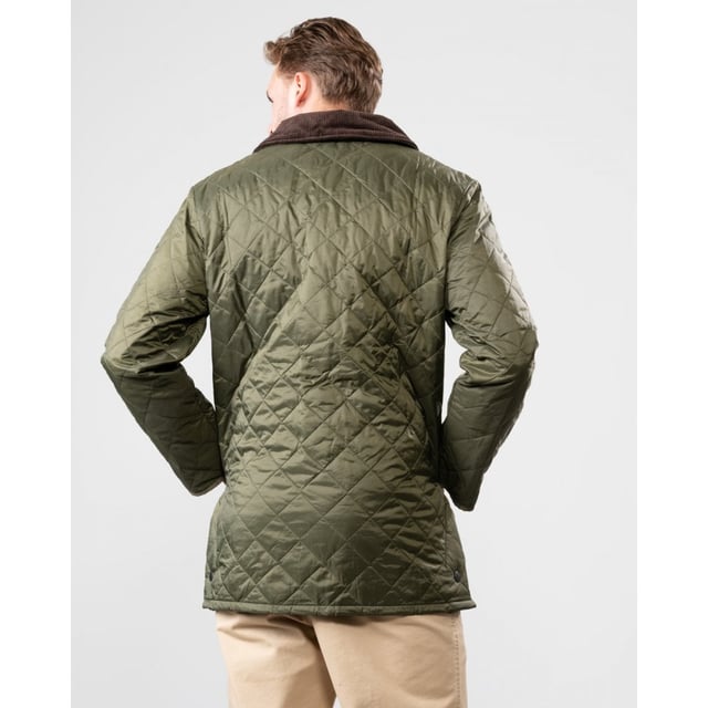 The Liddesdale provides plenty of room for laying and a generous fit, we suggest you go down one size if you prefer to wear this as a summer jacket. One of the most iconic Barbour jackets, the original Liddesdale jacket is a firm favourite year after year.
With Barbour's signature diamond quilted outer and a warm yet lightweight contrast nylon lining, this popular men's quilted jacket is durable, simple and stylish. From the Classic collection and available in a range of wearable colours, it features a robust front stud fastening to protect from the elements, and a smart sit-down cord collar that can be raised for additional warmth and protection, with a luxuriously soft feel against the skin.
With a generous fit, the Liddesdale provides plenty of room for layering up with chunky knits and insulating gilets, while the studded rear vents ensure comfort and ease of movement. The signature front patch pockets are trimmed with contrast Barbour embroidery and are generously proportioned, while a zipped inner security pocket safeguards valuables. A timeless addition to any winter wardrobe.

Regular Fit
100% polyamide
Two inch box quilted with 100g polyester wadding
Machine washable
Back length: 30-34in / 76.3-86.3cm