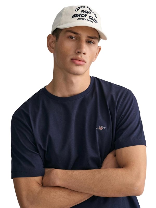 Gant Original T-Shirt is a classic crew-neck tee with logo embroidery on the chest. Feature Short Sleeves and a Crew Neckline. Crafted With 100% Cotton, these Lightweight and breathable Regular Fit T-shirts are Machine Washable.