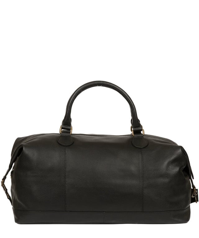The 'Harbour' holdall from Cultured London is handmade from genuine leather that has a rich texture for a distinct finish and the zip-over top conceals the spacious interior, lined with robust and untreated 100% cotton. A zipped pocket adorns the front of the holdall which is ideal for on-the-go storage and comes with matching leather handles alongside the adjustable and detachable webbed strap, with a drop length of 80cm. Finished with the clean and minimalist embossed Cultured London logo.